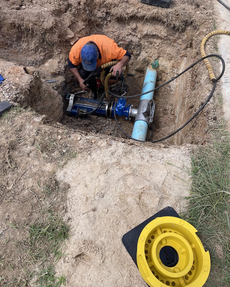 Valve Work In An Open Pit — Tighten Plumbing Solutions